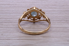Load image into Gallery viewer, Swiss Blue Topaz set Yellow Gold Ring