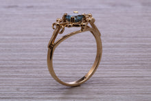 Load image into Gallery viewer, Swiss Blue Topaz set Yellow Gold Ring
