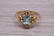 Load image into Gallery viewer, Swiss Blue Topaz set Yellow Gold Ring