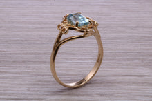 Load image into Gallery viewer, Swiss Blue Topaz set Yellow Gold Ring