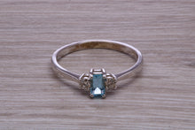Load image into Gallery viewer, Petite Blue topaz and Diamond set White Gold Trilogy Ring
