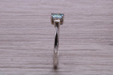 Load image into Gallery viewer, Petite Blue topaz and Diamond set White Gold Trilogy Ring