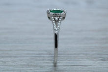Load image into Gallery viewer, Emerald and Diamond Halo Ring