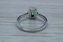 Load image into Gallery viewer, Emerald and Diamond Halo Ring