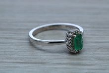 Load image into Gallery viewer, Emerald and Diamond Halo Ring