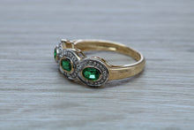 Load image into Gallery viewer, Three Emeralds and Diamonds set Yellow Gold Ring
