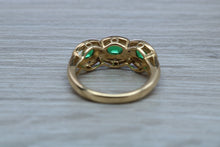 Load image into Gallery viewer, Three Emeralds and Diamonds set Yellow Gold Ring