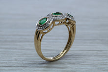 Load image into Gallery viewer, Three Emeralds and Diamonds set Yellow Gold Ring