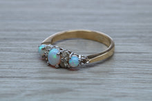 Load image into Gallery viewer, Fiery Opal and Diamonds set Yellow Gold Ring