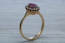 Load image into Gallery viewer, Oval cut Ruby and Diamond Cluster Ring