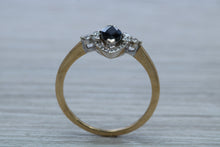 Load image into Gallery viewer, Marquise cut Halo set Blue Sapphire and Diamond Ring