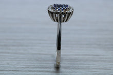 Load image into Gallery viewer, One carat AAA Grade Tanzanite and Diamond Halo Ring