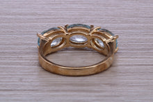 Load image into Gallery viewer, Sky Blue Topaz set Yellow Gold Twist Shank Ring