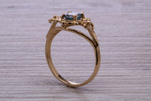 Load image into Gallery viewer, Swiss Blue Topaz set Yellow Gold Ring