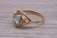 Load image into Gallery viewer, Swiss Blue Topaz set Yellow Gold Ring