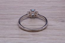 Load image into Gallery viewer, Petite Blue topaz and Diamond set White Gold Trilogy Ring