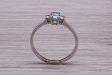 Load image into Gallery viewer, Petite Blue topaz and Diamond set White Gold Trilogy Ring