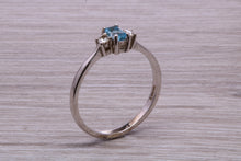 Load image into Gallery viewer, Petite Blue topaz and Diamond set White Gold Trilogy Ring