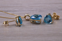 Load image into Gallery viewer, Trillion cut Swiss Blue Topaz Matching Earrings and Necklace set in Yellow Gold