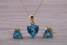 Load image into Gallery viewer, Trillion cut Swiss Blue Topaz Matching Earrings and Necklace set in Yellow Gold