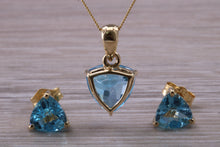 Load image into Gallery viewer, Trillion cut Swiss Blue Topaz Matching Earrings and Necklace set in Yellow Gold