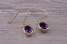 Load image into Gallery viewer, Natural Oval cut Amethyst dropper earrings, set in solid 9ct Yellow gold