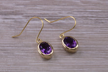 Load image into Gallery viewer, Natural Oval cut Amethyst dropper earrings, set in solid 9ct Yellow gold