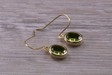 Load image into Gallery viewer, Natural Oval cut Peridot dropper earrings, set in solid 9ct Yellow gold