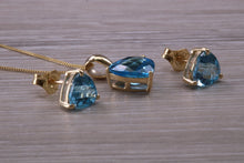 Load image into Gallery viewer, Trillion cut Swiss Blue Topaz Matching Earrings and Necklace set in Yellow Gold