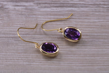 Load image into Gallery viewer, Natural Oval cut Amethyst dropper earrings, set in solid 9ct Yellow gold