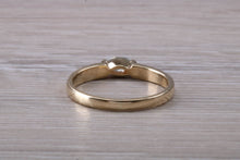 Load image into Gallery viewer, Dainty Marquise cut Light Blue Topaz set Yellow Gold Ring