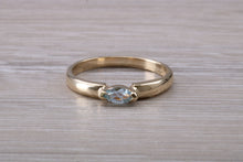 Load image into Gallery viewer, Dainty Marquise cut Light Blue Topaz set Yellow Gold Ring