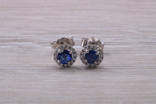 Load image into Gallery viewer, Blue Sapphire and Diamond Halo set Stud Earrings