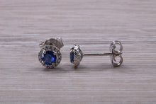Load image into Gallery viewer, Blue Sapphire and Diamond Halo set Stud Earrings