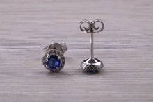 Load image into Gallery viewer, Blue Sapphire and Diamond Halo set Stud Earrings