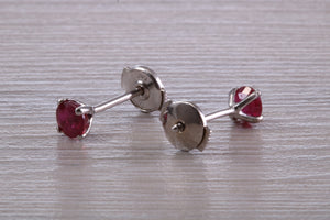 Stunning 1 carat Ruby set Platinum Solitaire Stud Earrings, with Special Safety Backs