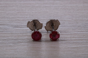Stunning 1 carat Ruby set Platinum Solitaire Stud Earrings, with Special Safety Backs
