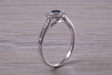 Load image into Gallery viewer, Beautiful Blue Sapphire and Halo set Diamond Ring