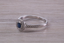 Load image into Gallery viewer, Beautiful Blue Sapphire and Halo set Diamond Ring