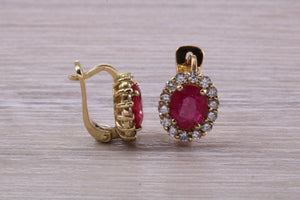 Beautiful Ruby and Diamond Halo set Earrings