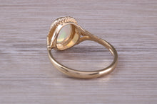 Load image into Gallery viewer, Oval cut Natural Opal set Yellow Gold Ring