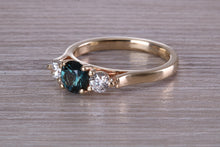 Load image into Gallery viewer, Teal Blue Sapphire and Diamond Trilogy Ring
