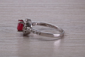 One and Half carat Stunning Ruby and Diamond Halo set Ring