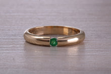 Load image into Gallery viewer, Tension set Emerald in Chunky Yellow Gold Band, British Hallmarked