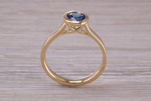 Load image into Gallery viewer, One carat Blue Sapphire set 18ct Yellow Gold Solitaire