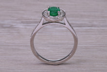 Load image into Gallery viewer, Emerald and Halo Diamond set Platinum Ring