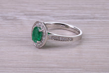 Load image into Gallery viewer, Emerald and Halo Diamond set Platinum Ring