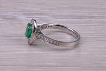 Load image into Gallery viewer, Emerald and Halo Diamond set Platinum Ring