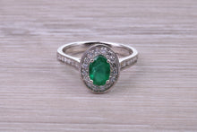 Load image into Gallery viewer, Emerald and Halo Diamond set Platinum Ring