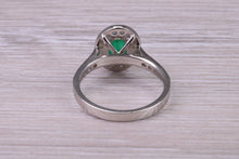 Load image into Gallery viewer, Emerald and Halo Diamond set Platinum Ring
